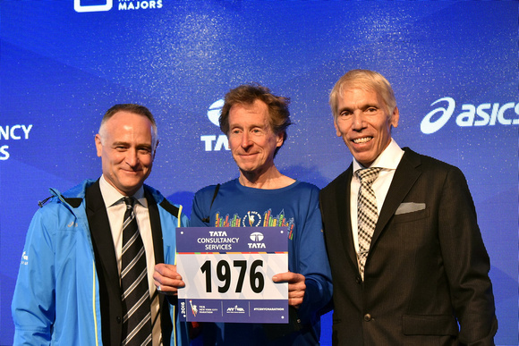 NYRR President and CEO Michael Capiraso and NYRR President of Events and Race Director of the TCS New York City Marathon Peter Ciaccia welcome 1976 New York City Marathon champion Bill Rodgers at the
